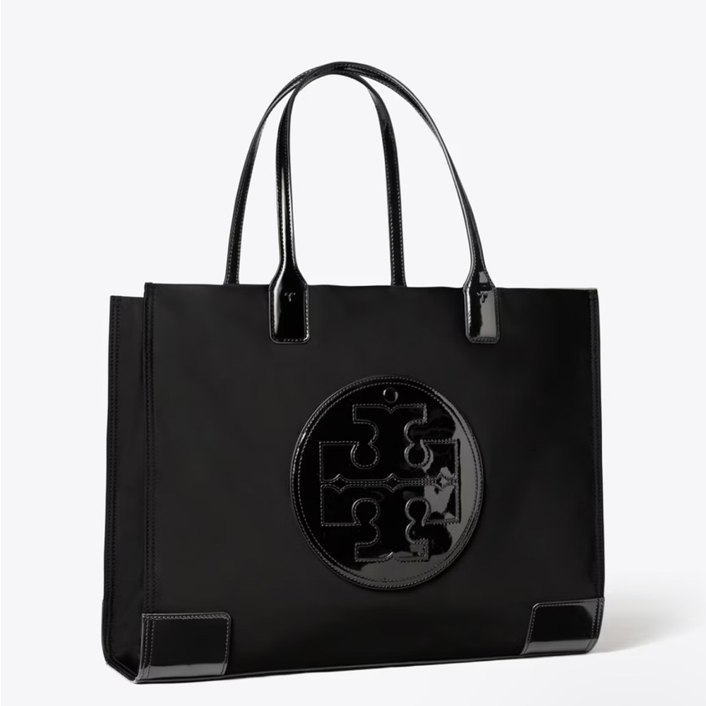 The Tory Burch Ella Tote Bag is made of durable recycled nylon with paten trim.